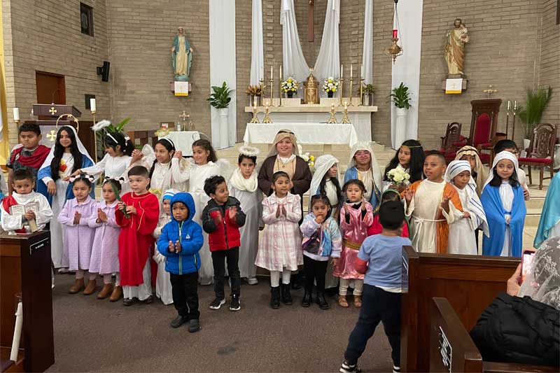 children dressed as saints